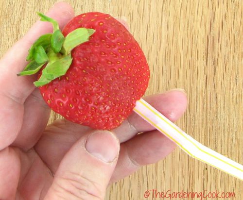 hull strawberries with a straw