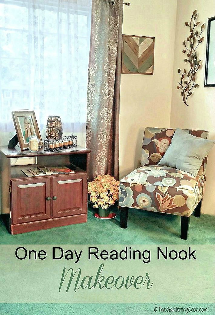 One Day Reading Nook Makeover. Chair with a cushion, plant and table with pictures and candles. Text overlay reading One Day Reading Nook Makeover.