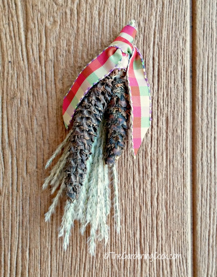 Glued decorations for the Thanksgiving dinner menu plaque