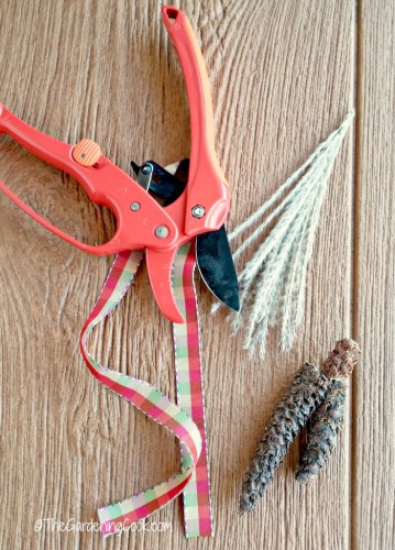 glued pine cones and trimmed frond