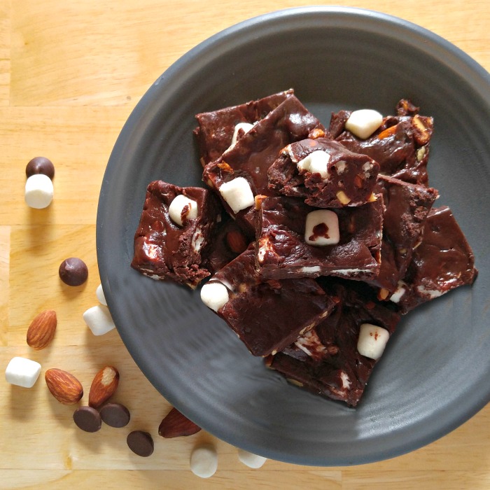 Rocky road fudge in a gray bowl with marshmallows and nuts