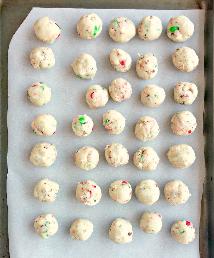 Truffle balls on parchment paper.