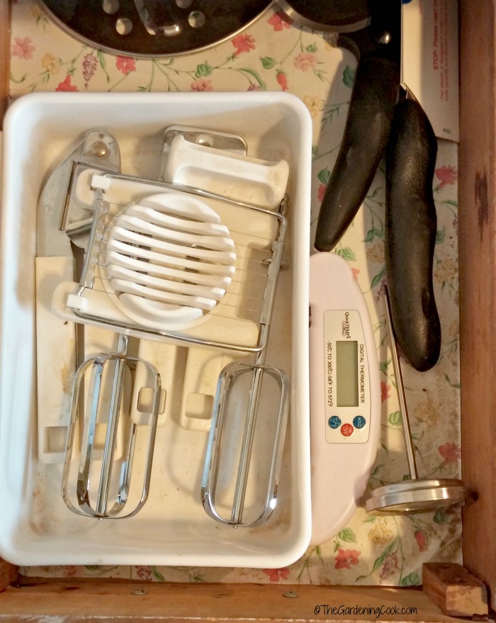 Medium sized items and oven gadgets go near the stove.
