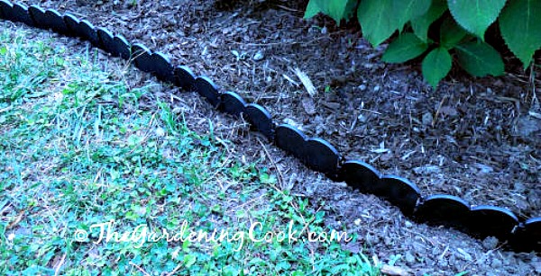 Inspect plastic edges for breaks early in the spring and repair it.