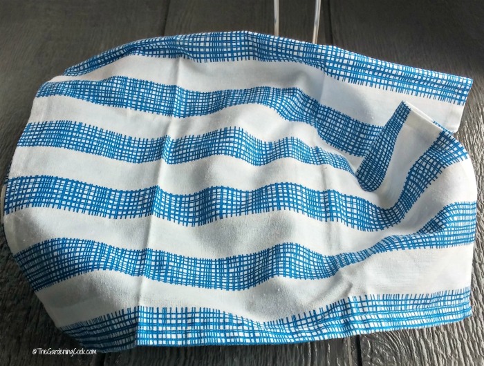 Line the basket with a blue tea towel