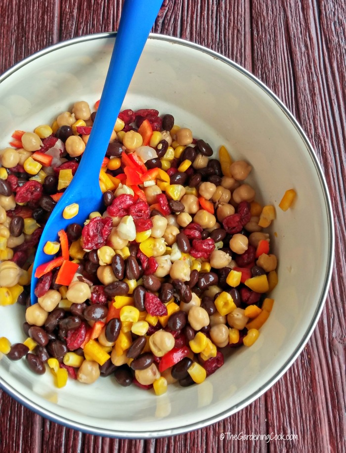 Add the garlic and peppers to the chickpea mixture