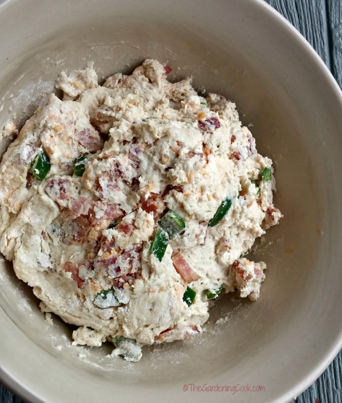 Bacon jalapeno cheese bread batter in a bowl.
