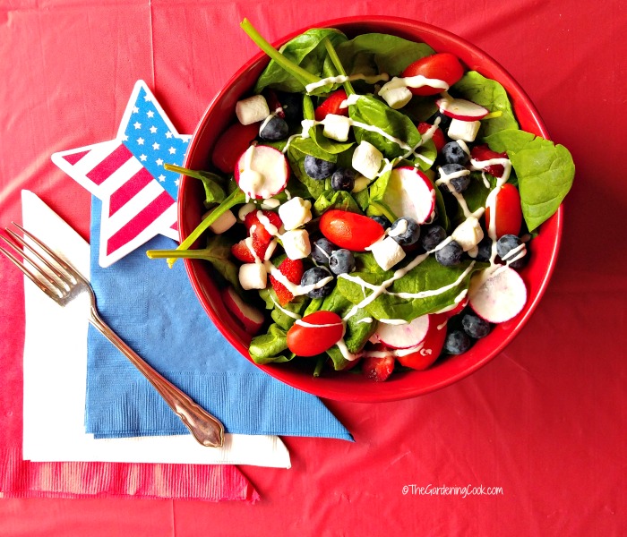 Patriotic Garden Salad with star flag and red white and blue napkins.