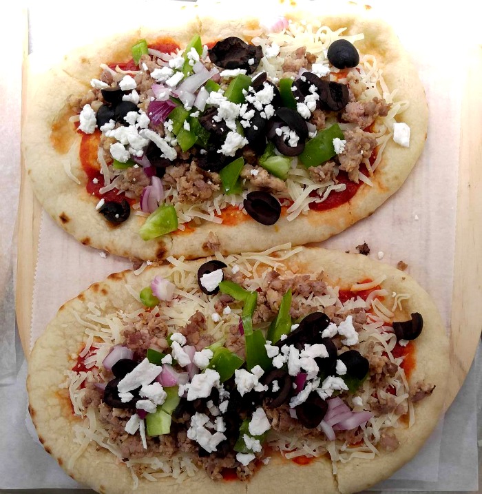 pizzas on parchment paper Assemble your pizza on Parchment paper and also use it to reheat pizza in the microwave.