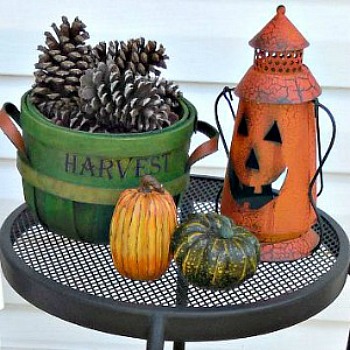 Halloween holiday decorations on a black table.