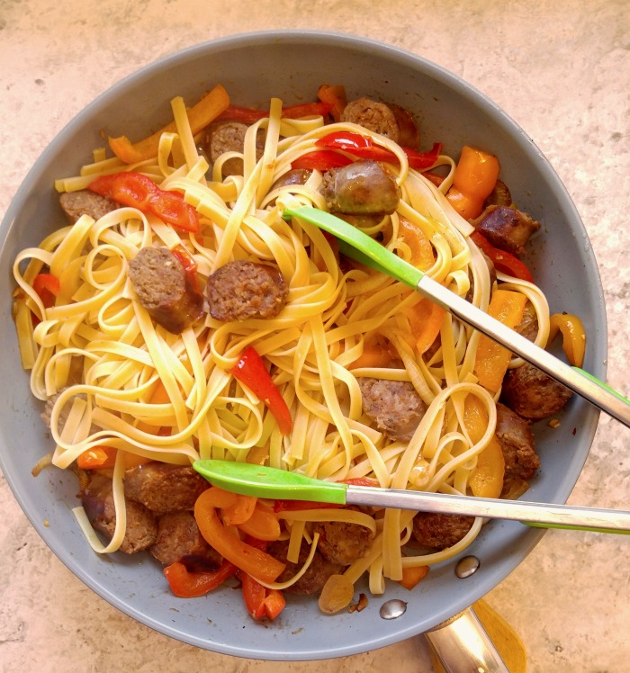 Add the sausages and fettuccine