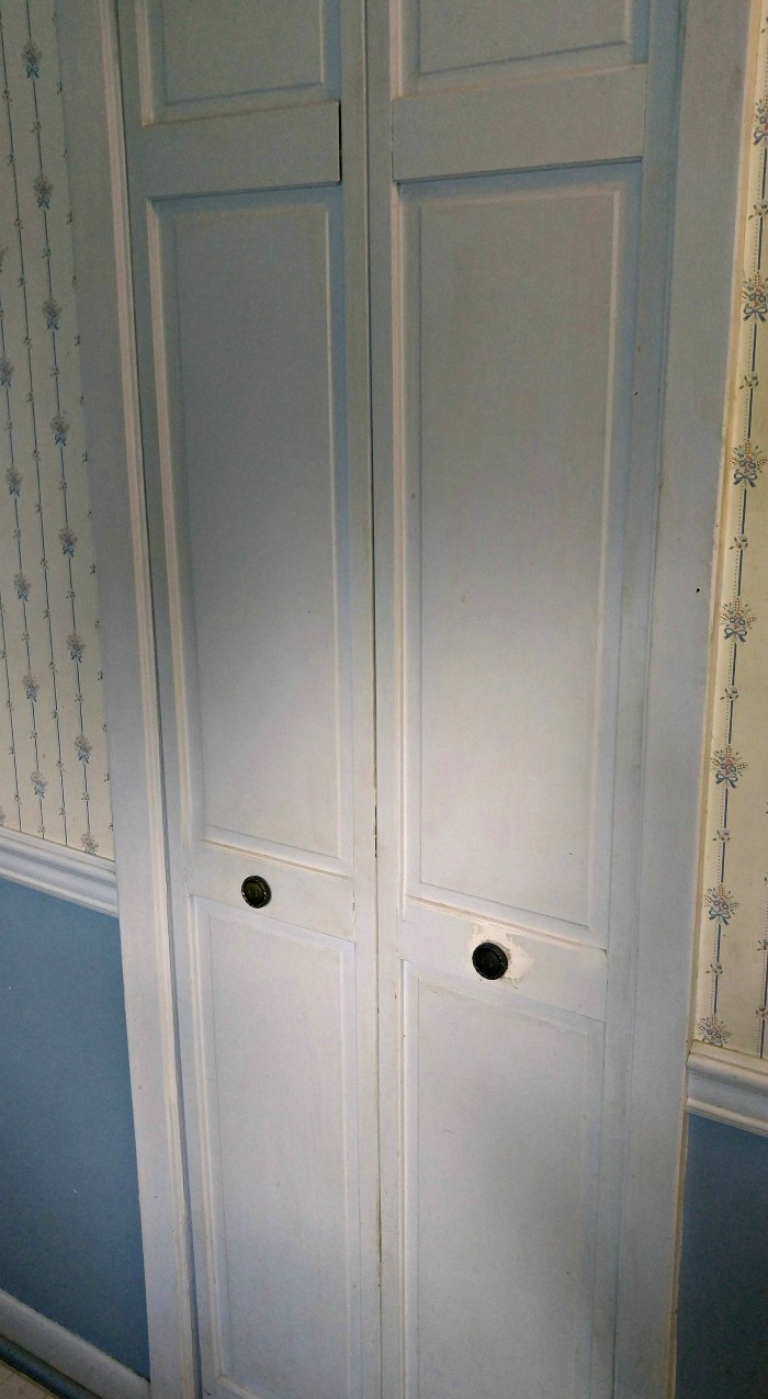 This concertina pantry door will be replaced with a sliding barn board door