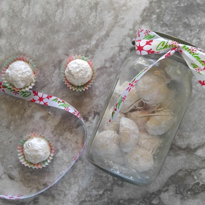 Mason jars make a cute cookie jar for these lemon snowball cookies