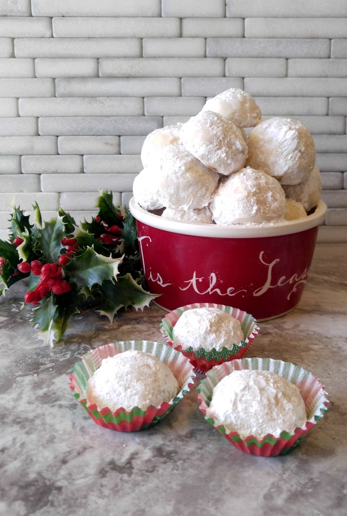Lemon Snowball Cookies in a pretty holiday serving dish