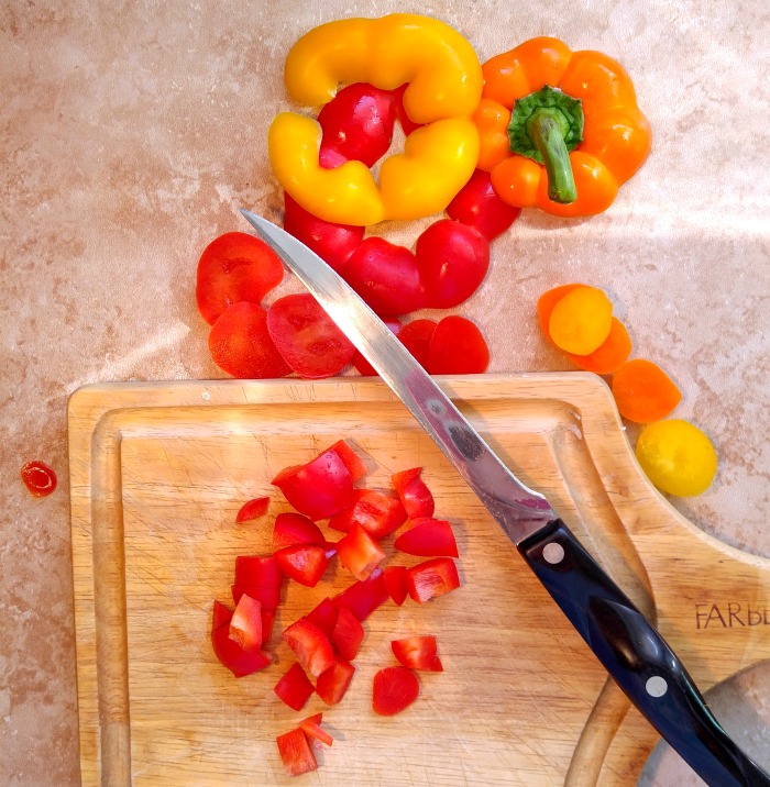 Chop the bottom and top of the peppers