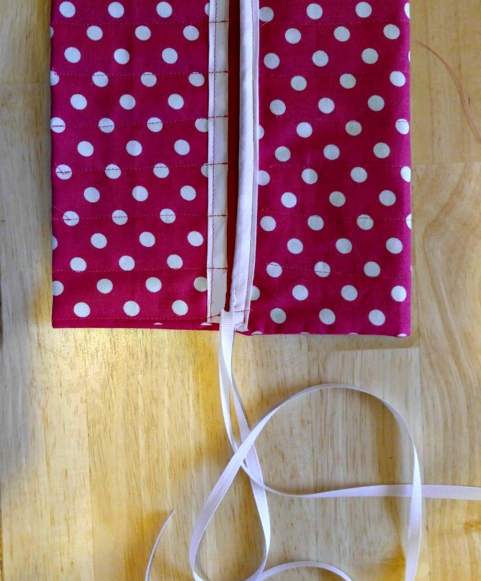 Attached ribbon tie to pen holder