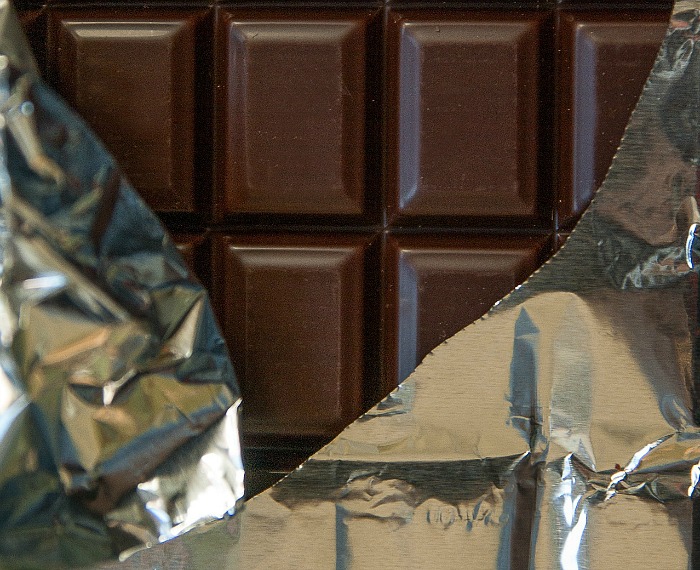 Eat dark chocolate instead of milk chocolate as a snack