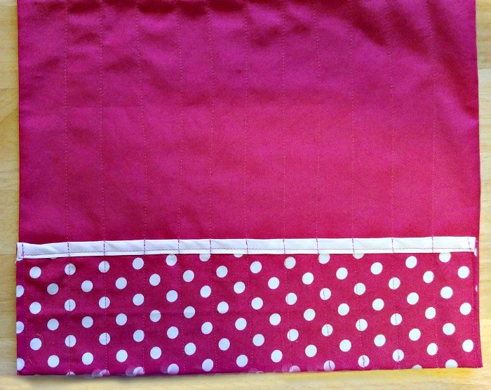 Stitched pen slots pocket on pink pen holder