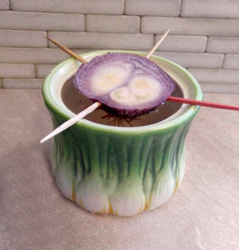 Suspend the onion bottom over water with toothpicks.