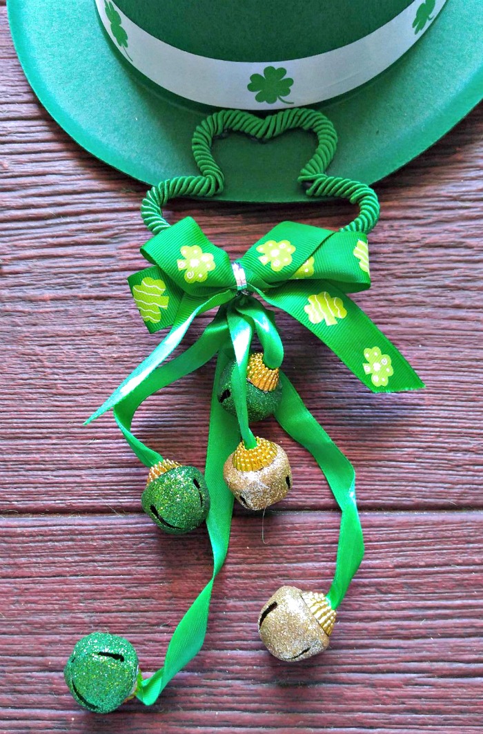 Leprechaun hat with shamrock and bells.