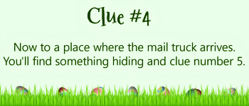 Grass and Easter eggs with clue #4 about the mail box.
