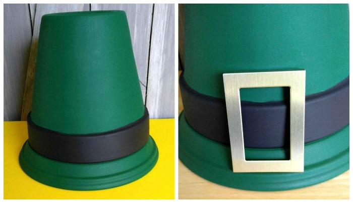 Clay pots painted like a leprechaun hat with a gold picture frame as a buckle.
