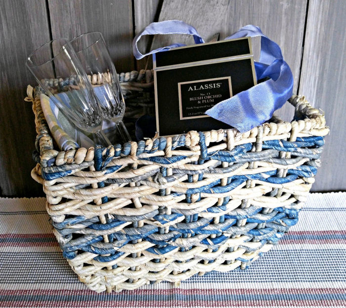 Candles and champagne flutes in a pretty basket makes the perfect anniversary gift