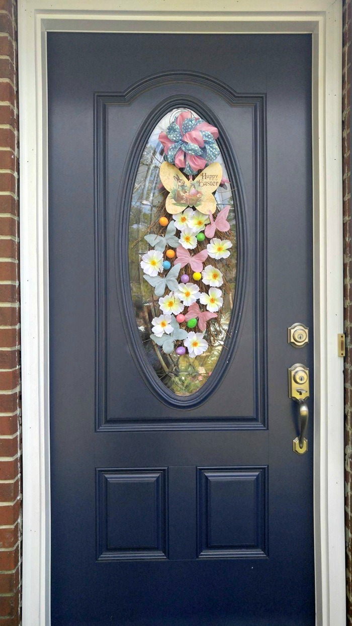Easter Grapevine Door Swag on a blue entry door