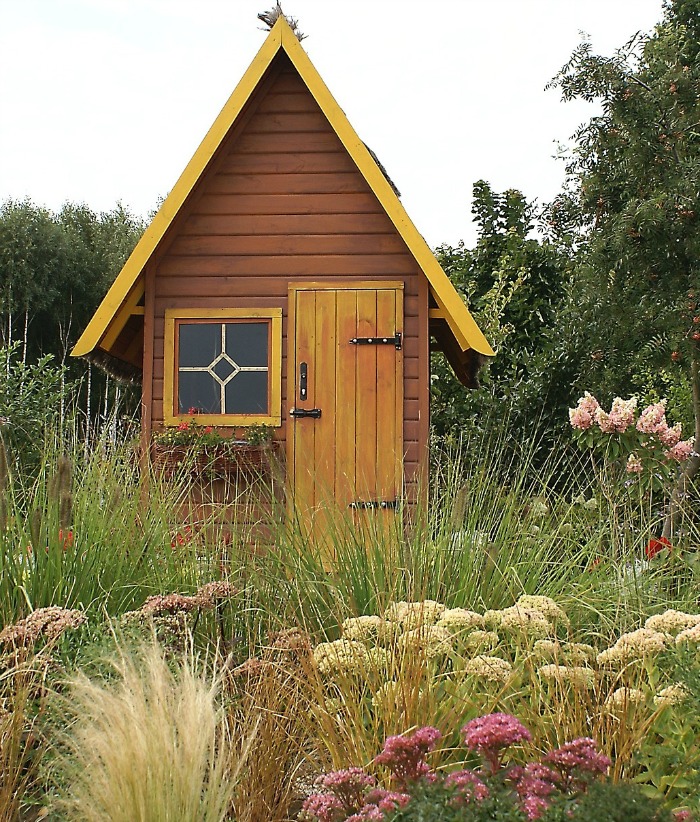 I love the pointed roof of this Garden Shed