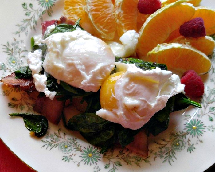 Add the poached egg to the stacks