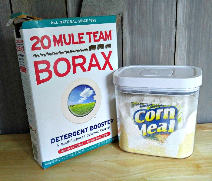 Borax and corn meal can be used to dry flowers