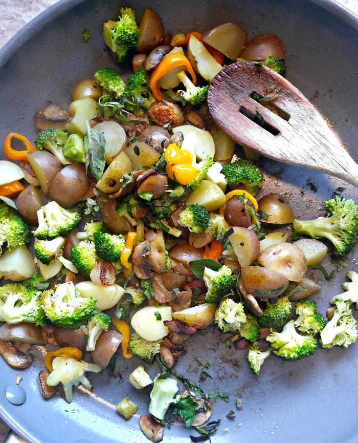 Add potatoes and bacon to the vegetable mixture.