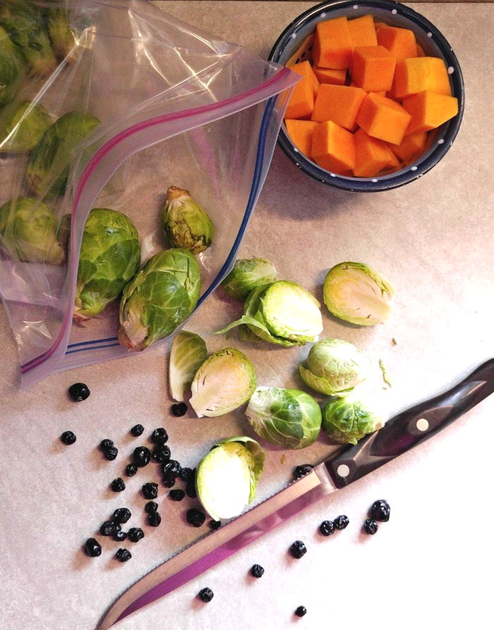 sprouts, squash and blueberries with a sharp knife.