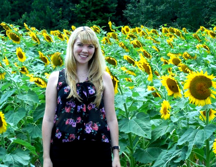 My daughter in a field of sunflowers