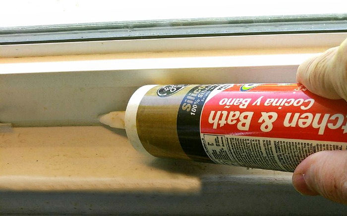 caulk leaks in windows