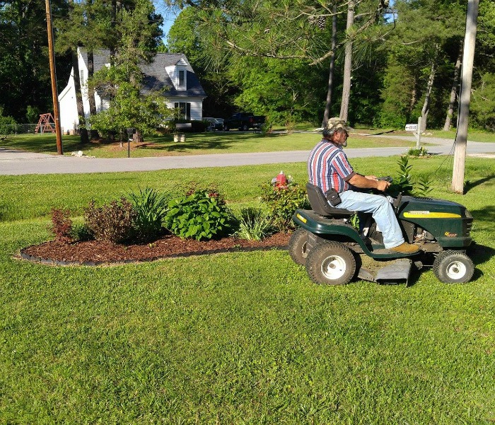 Keep the lawn mower blades higher in the summer months
