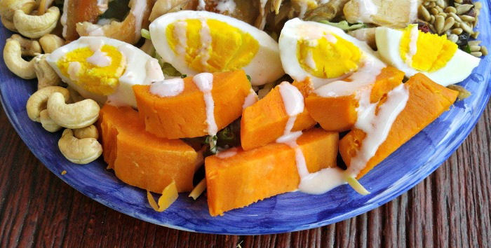 Hard boiled eggs and sweet potatoes add color to this salad