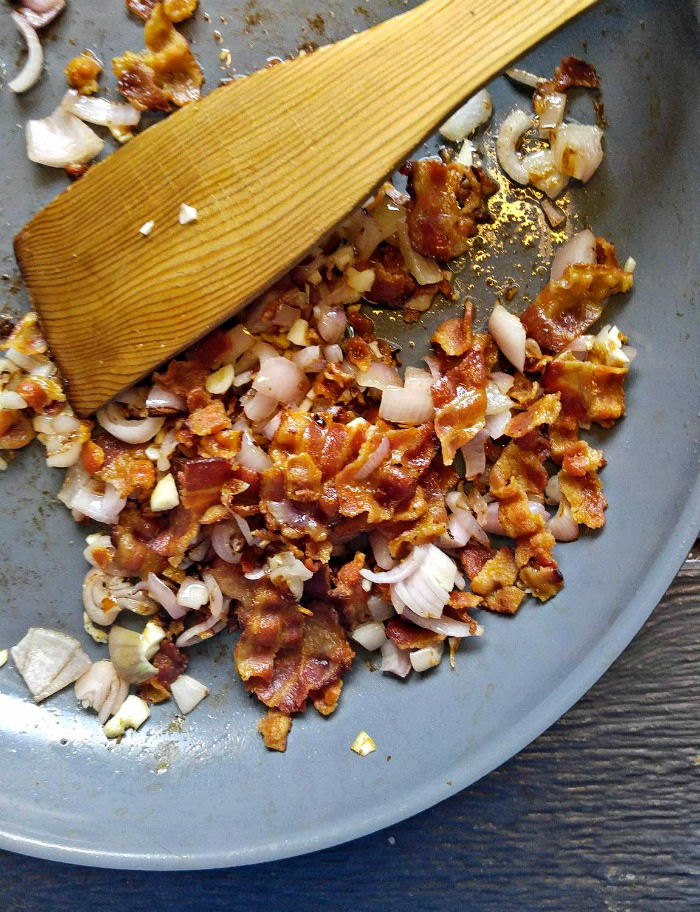 cooking bacon, shallots and garlic Cook shallots garlic and bacon
