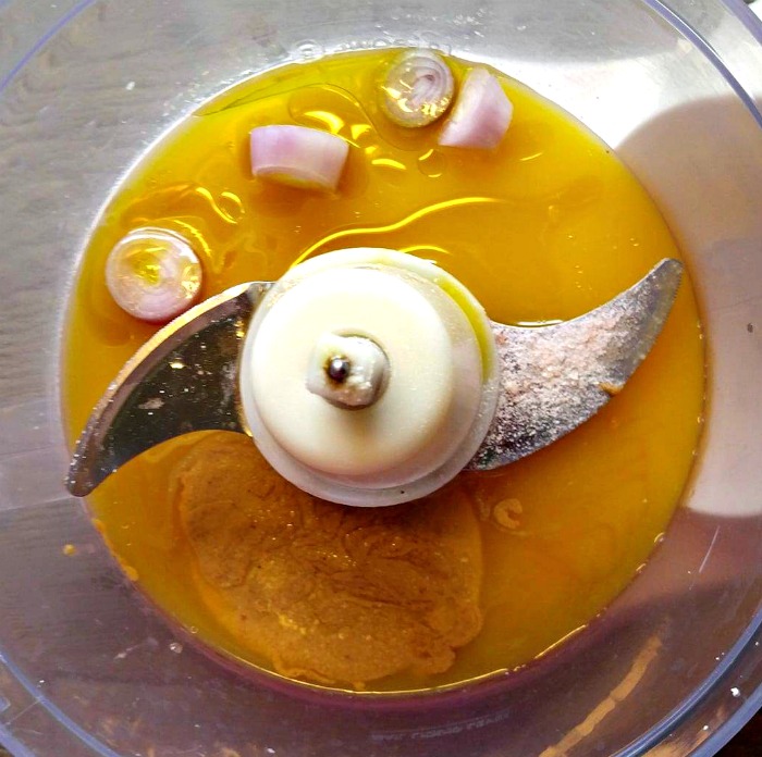 Making the orange almond butter dressing