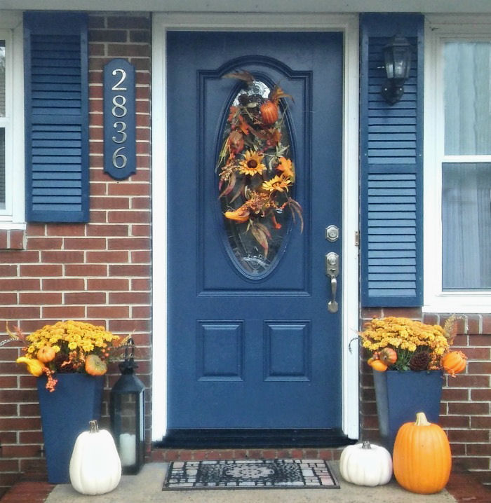 Decorate an entryway for fall.