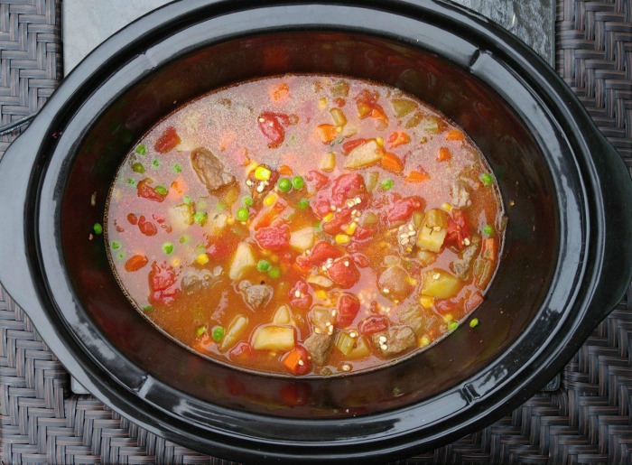 Barley and tomatoes are added to the beef soup