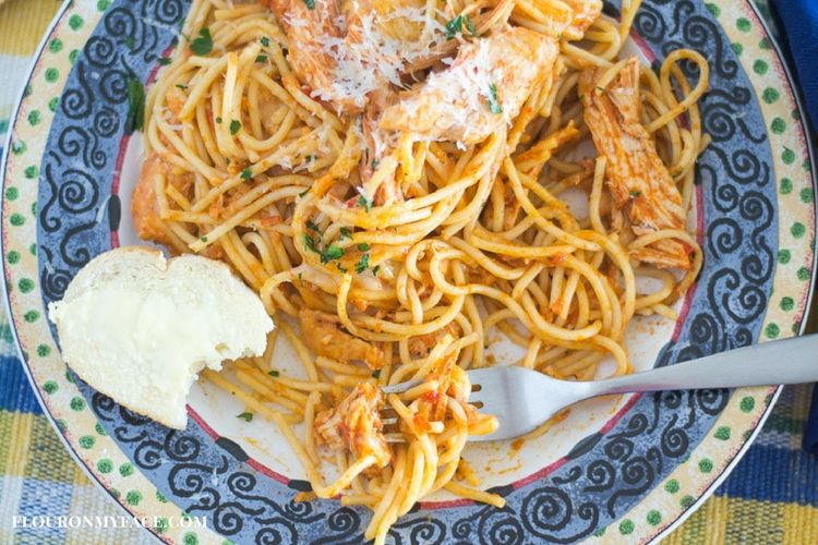 Crock pot cheesy chicken spaghetti from Flour on my Face