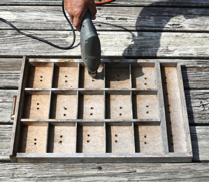 Drilling holes in a wooden drawer