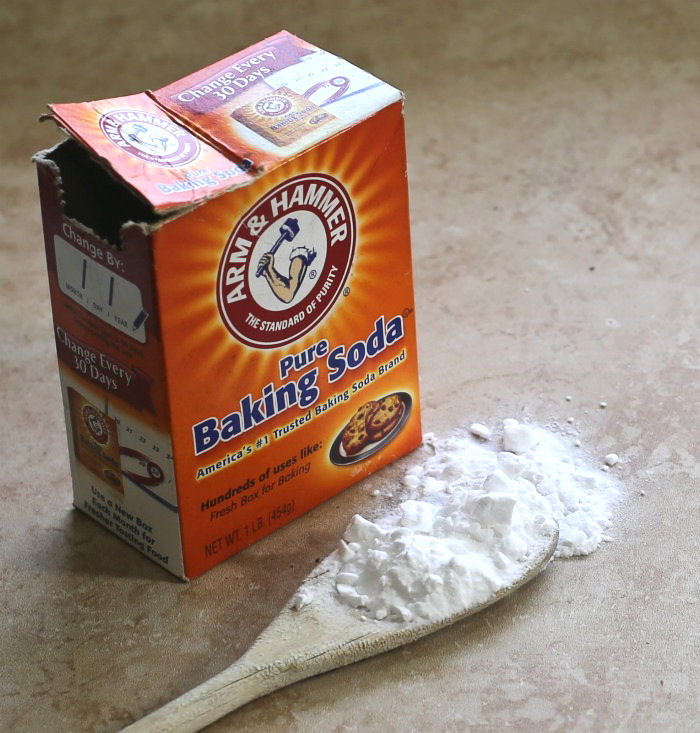 Box of baking soda with some spilled sodium bicarbonate