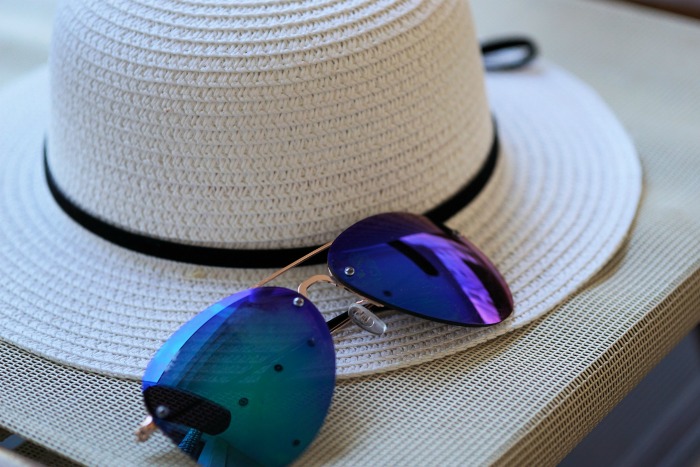 Sun hat and sun glasses