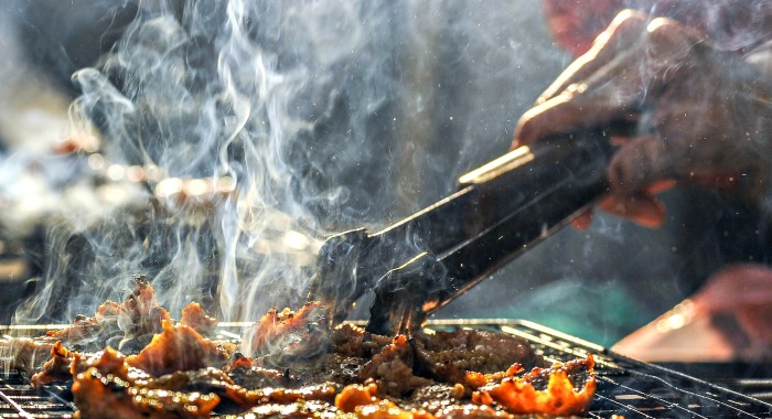 Use long handled tools for hot fires