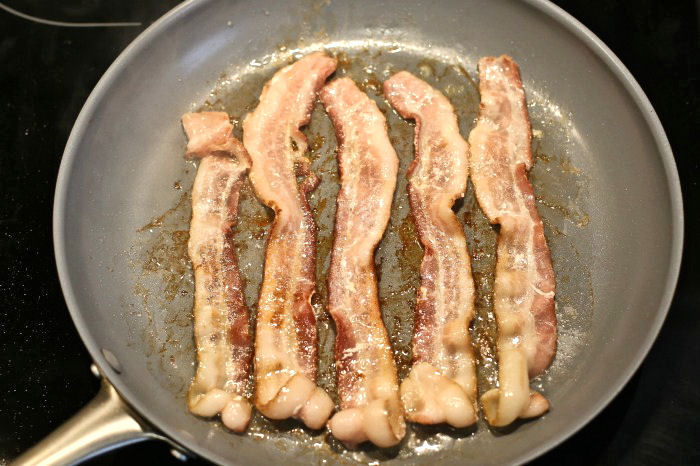 bacon cooking in a pan