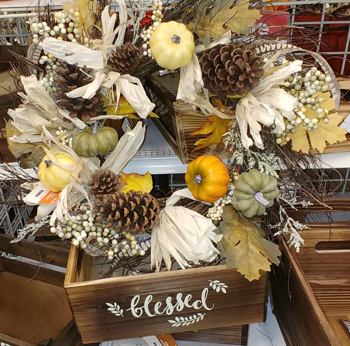 Pretty fall wreath with natural elements such as pine cones is easy to put together