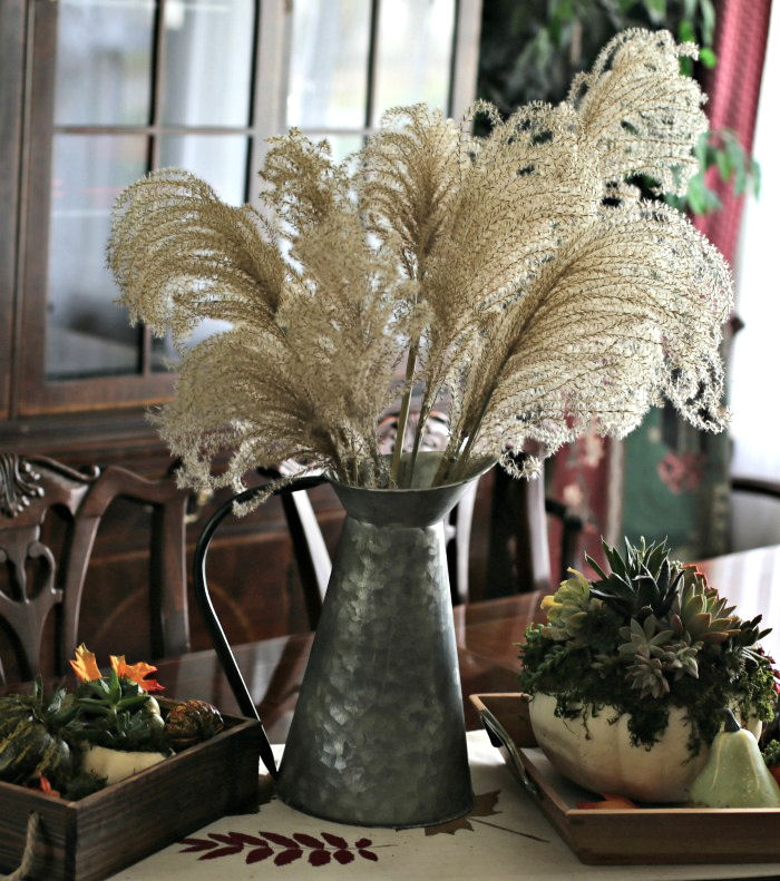 Silver grass in a galvanized water jug