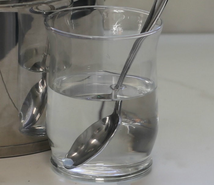 Sugar in water to the soft ball stage.